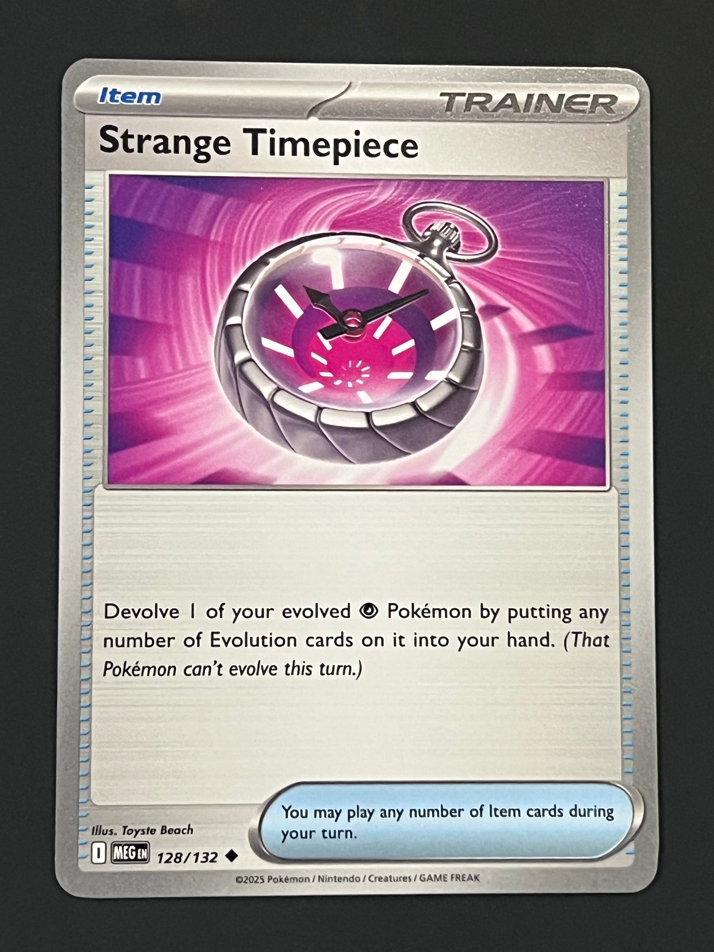 128/132 Strange Timepiece - Pokémon Mega Evolution Base Uncommon