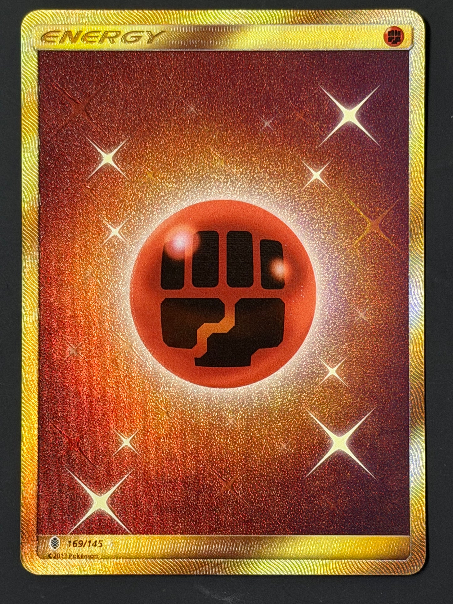 169/145 Fighting Energy - Pokémon Guardians Rising Gold Secret Rare